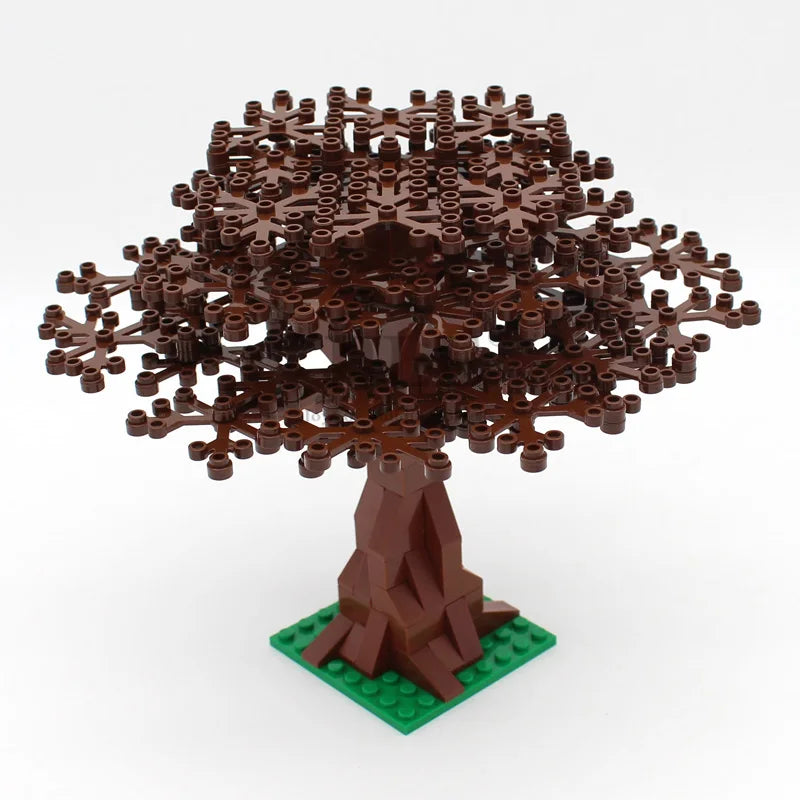 A model of a cherry blossom tree built from brown LEGO-style bricks, mounted on a green base.