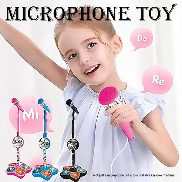 A young girl holds a pink microphone toy with an LED light and stand, demonstrating a portable karaoke machine.