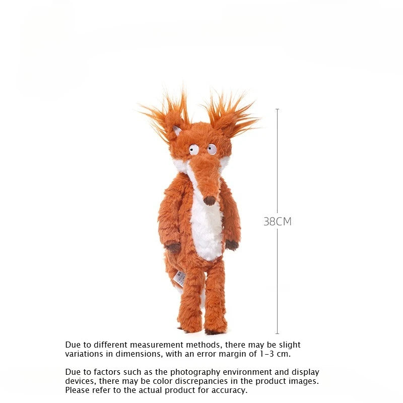 An orange fox plushie with spiky fur and white accents, shown standing upright.