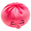 A bright pink, squishy dumpling-shaped stress relief toy with closed eyes and a protruding nose.