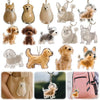 A collection of dog-shaped pet hair keepsakes and keychains in various natural and gray tones.