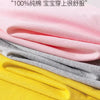 Pink, gray, and yellow t-shirts folded together showing fabric texture.