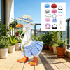 A white goose mascot wearing a blue plaid outfit, orange feet, and accessories like hats, sunglasses, and necklaces.