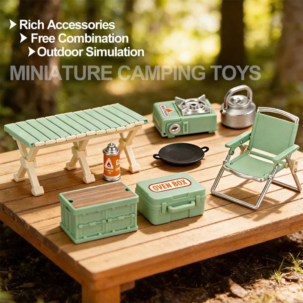 A miniature camping set featuring a wooden picnic table, cooking accessories, and outdoor simulation items for dollhouse or c