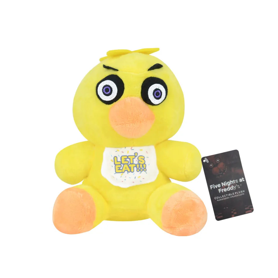 A yellow plush toy resembling a cartoon bird with large eyes and a tag that reads LET'S EAT