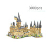 A set of 3000 pieces building a detailed medieval castle structure out of tan and gray blocks.