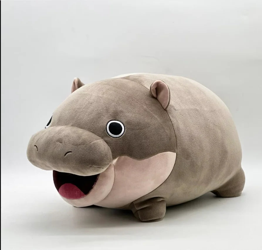 A soft gray Moo Deng Pygmy Hippo plush toy with large eyes and an open mouth.