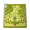 A soft green embroidered patch featuring a cartoon hippo character and foliage.