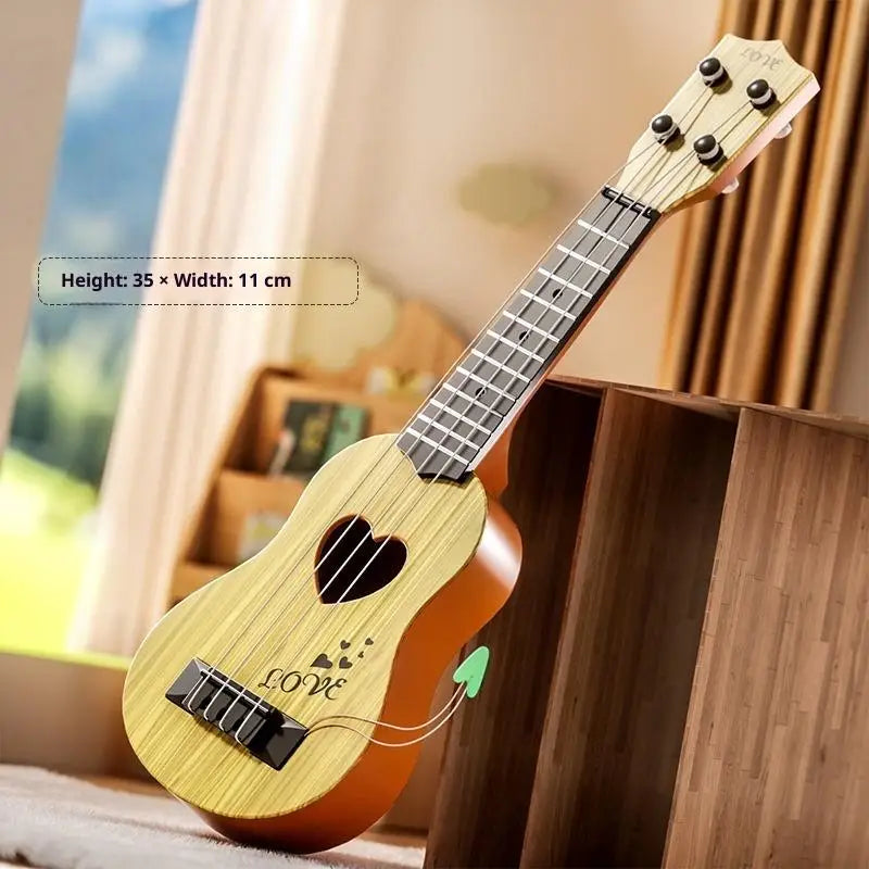 A wooden toy guitar with a heart design is displayed next to a window.