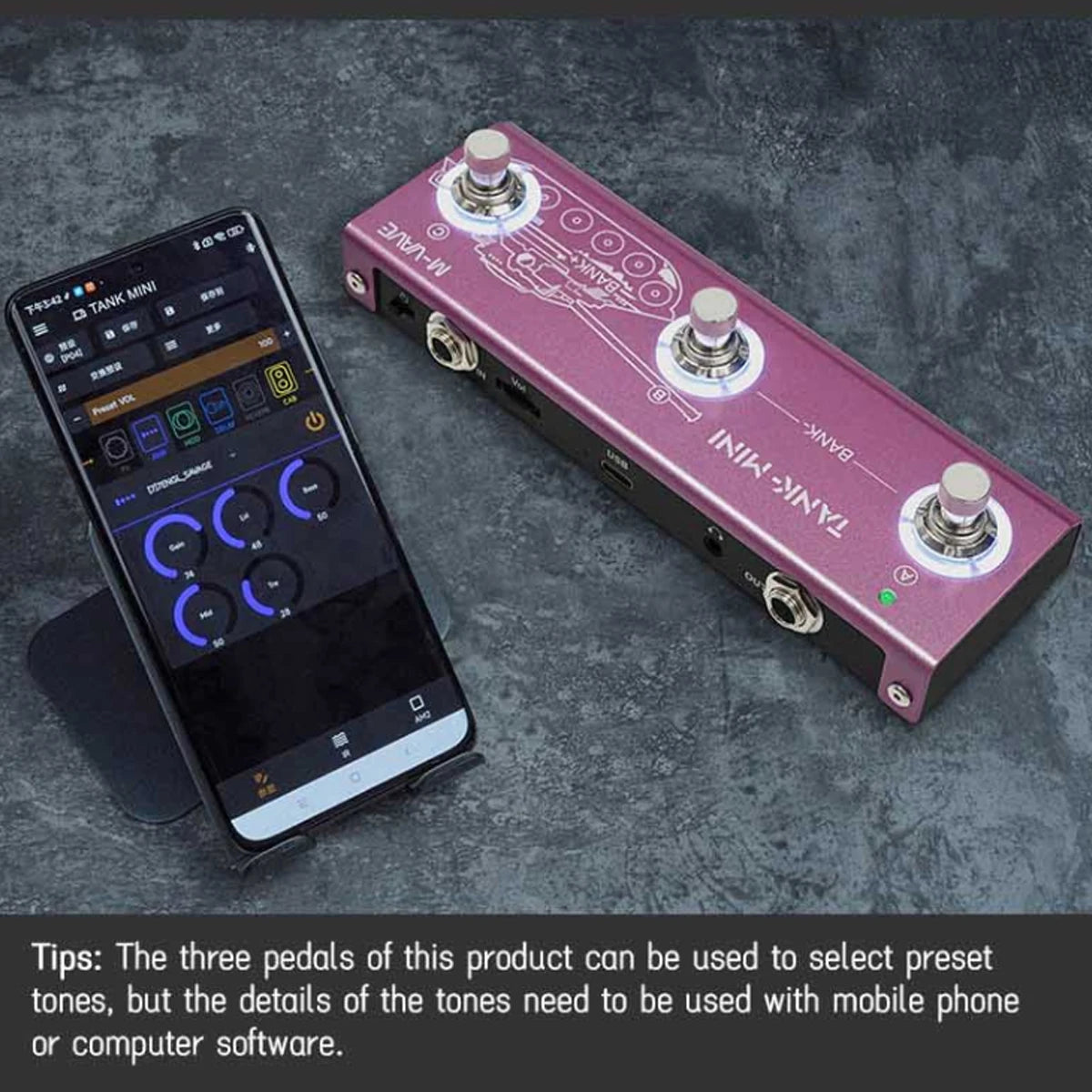 A pink multi-effects guitar and bass pedal is shown next to a smartphone.