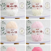 Six colors of soft chenille yarn balls displayed side by side for knitting and crochet projects