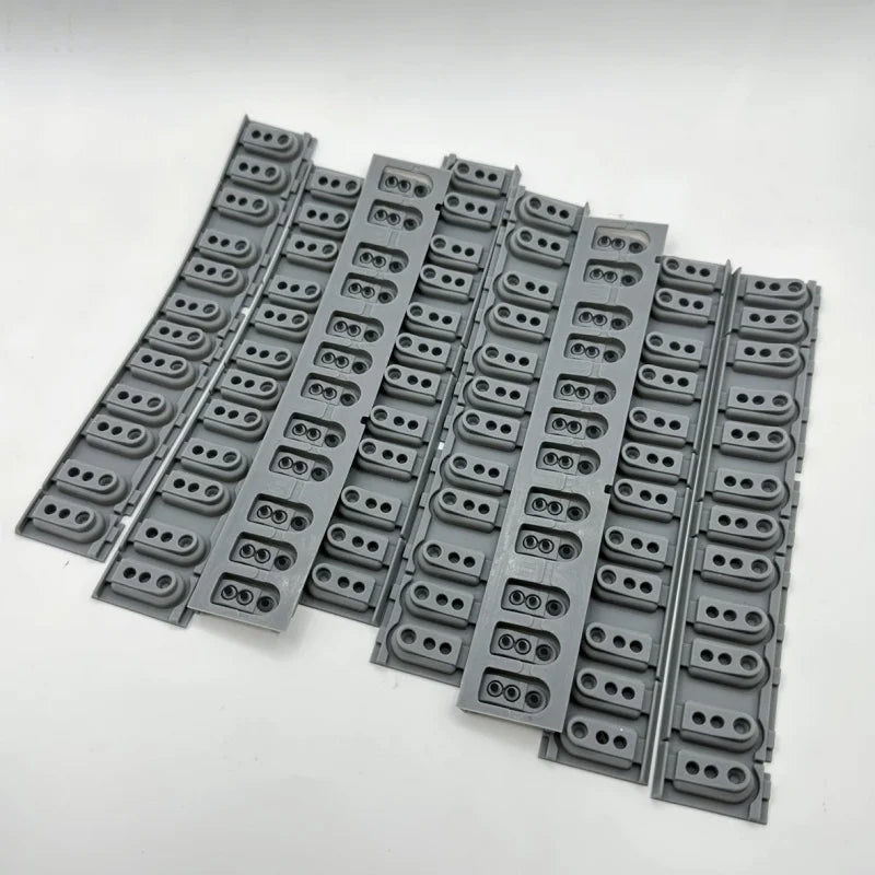 A collection of gray replacement keyboard contact strips for Yamaha digital pianos, arranged in rows.