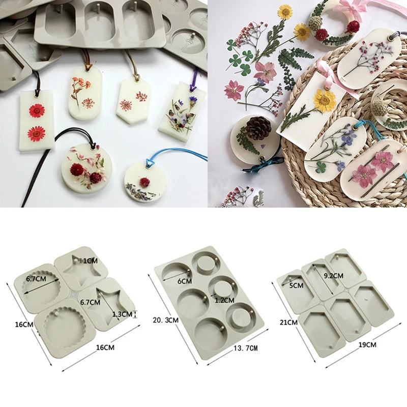 A collection of hexagonal silicone molds for handmade soap and candles in various colors and floral designs.