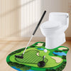A white toilet, a black putting practice set with mat, putter, and balls, placed on a green putting surface.