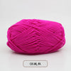 A ball of bright pink pre-dyed milk cotton yarn used for knitting and crochet.