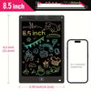 An 8.5 inch LCD drawing tablet showing various doodles and symbols on a black screen.