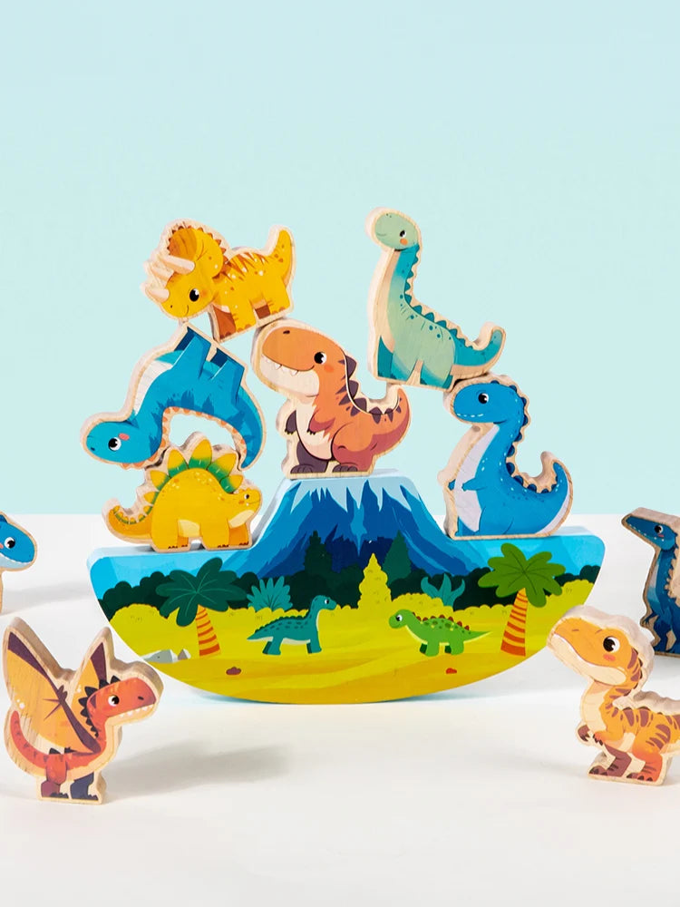 A set of wooden dinosaur stacking blocks in various colors and sizes arranged on a light blue background.