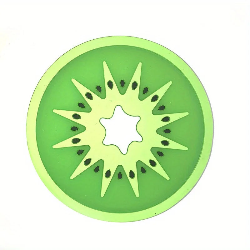 A round, lime green PVC coaster with a starburst fruit pattern design.