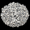A pile of small white acrylic alphabet letter beads for jewelry making