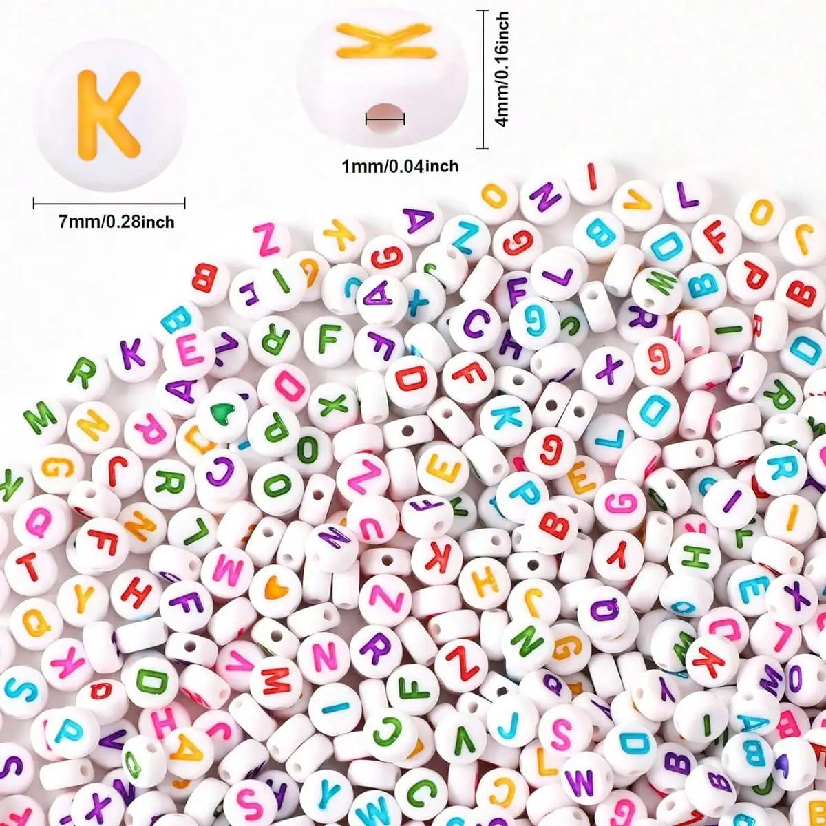 A close-up view of small white acrylic beads shaped like letters and numbers for jewelry making