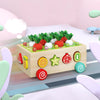 A wooden toy set featuring various radish-shaped magnetic pieces for matching and sorting.