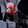 A fully articulated action figure of Yuji Itadori from Jujutsu Kaisen, featuring pink hair and a red jacket.