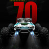 A dark, dramatic image of a high-speed 4WD RC monster truck with powerful upgrades and bright LED lights.
