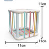 A colorful sensory sorting blocks set with vertical wooden rods and colored plastic pieces for babies and toddlers.