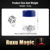 A clear jar with a blue lid contains small white dice, demonstrating a magic trick.