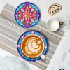 A set of DIY diamond painting coasters featuring a colorful cat mandala design on anti-slip wood.
