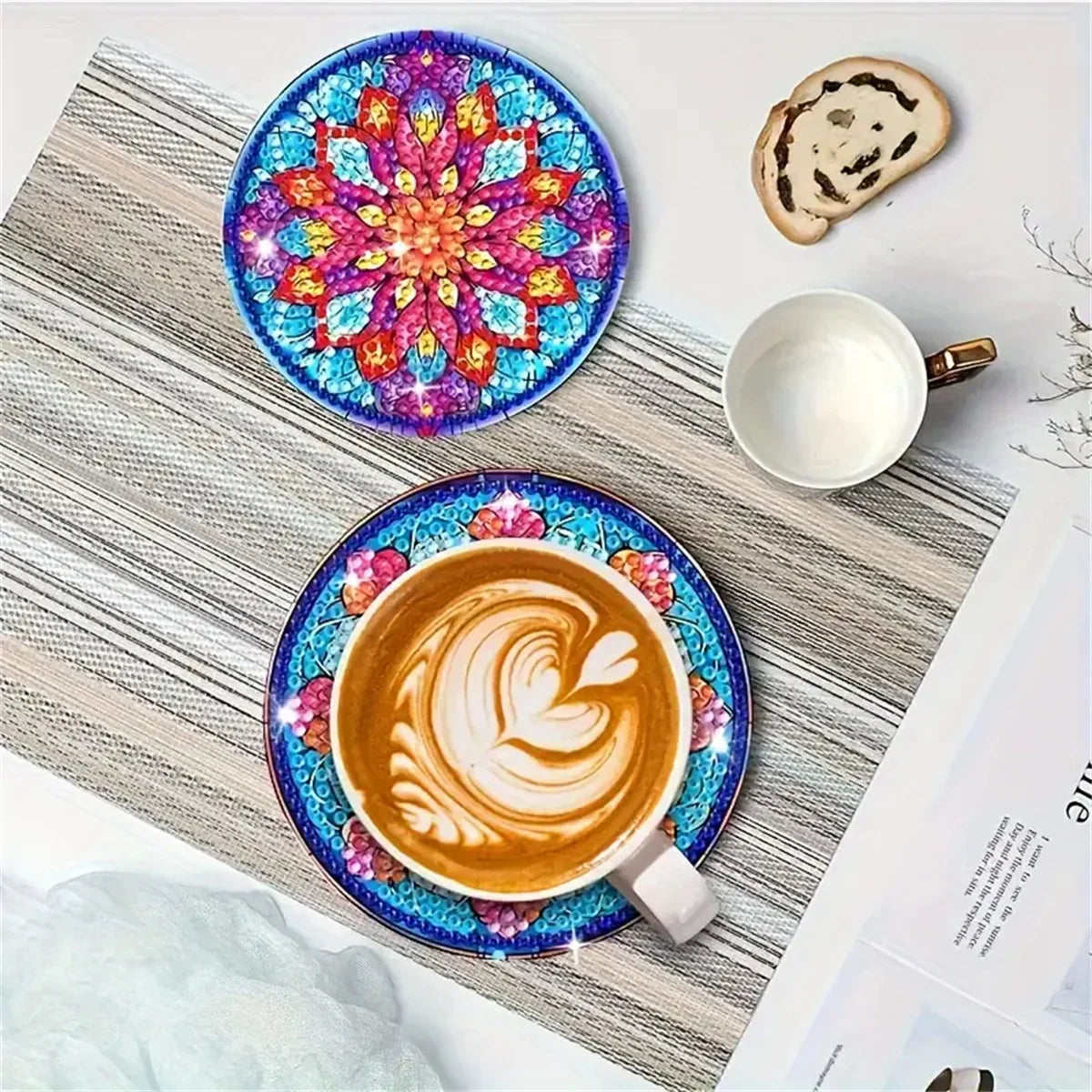 A set of DIY diamond painting coasters featuring a colorful cat mandala design on anti-slip wood.