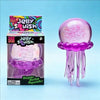 A pink Jellyfish Squish toy in its packaging and loose form, showing a soft water sensory fidget for stress relief.