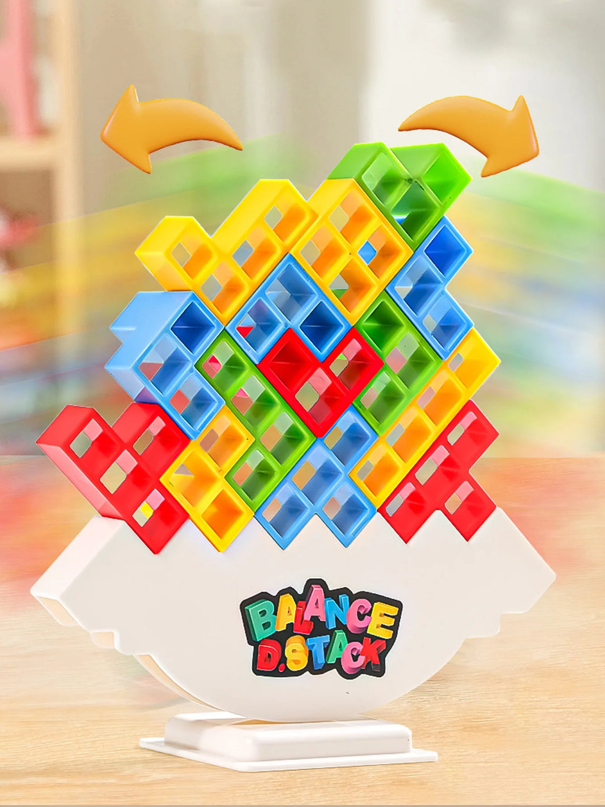 A colorful tower of multi-sized building blocks featuring red, green, blue, and yellow pieces.