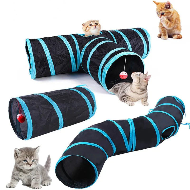 A black foldable S-shaped cat tunnel with blue accents and hanging ball toys, featuring several cats.