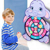 A purple cartoon elephant dart board game with sticky balls and a young boy playing.