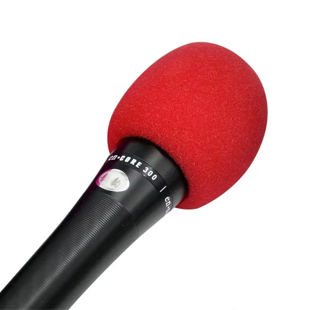 A red professional microphone foam windscreen and pop filter cover attached to a black microphone shaft.