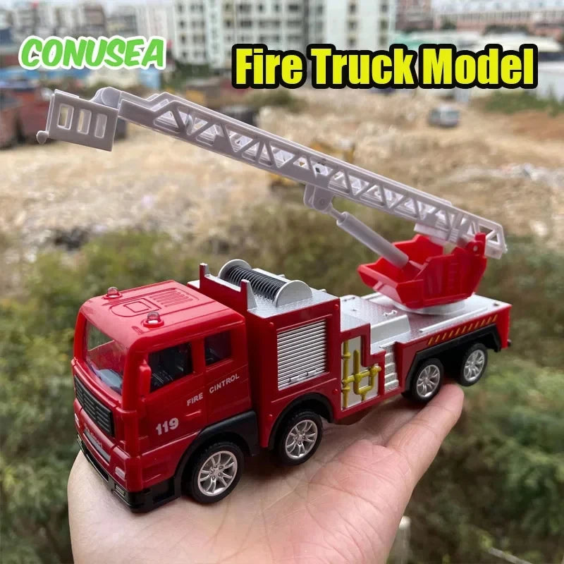 A red fire truck model with a movable ladder is held in a hand against a blurred outdoor background.