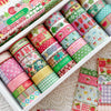 A collection of 35 rolls of colorful strawberry themed washi tape in various patterns and colors.