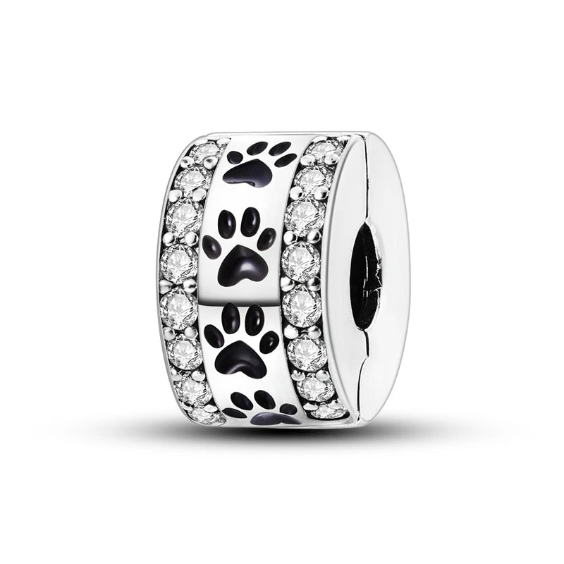 Sterling silver charm beads featuring paw prints and clear stones for DIY bracelet making