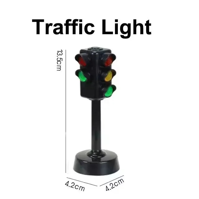 A black traffic light with three colored bulbs mounted on a stand.