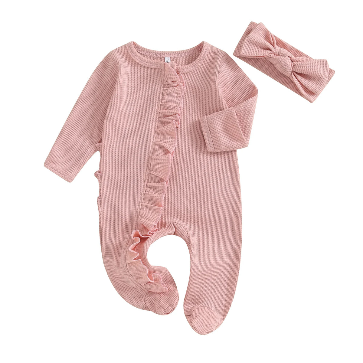 A pink knit romper for a baby girl featuring ruffled details and a matching bow headband.