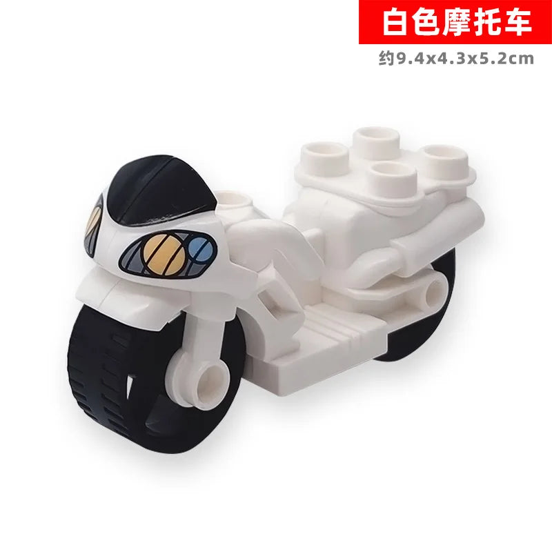 White building block set featuring a vehicle and trailer model.