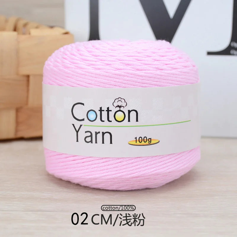 Pink cotton yarn skein labeled Cotton Yarn 100g for knitting and crochet