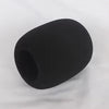A smooth, black foam windscreen pop filter cover for a professional microphone.