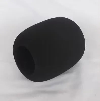 A smooth, black foam windscreen pop filter cover for a professional microphone.