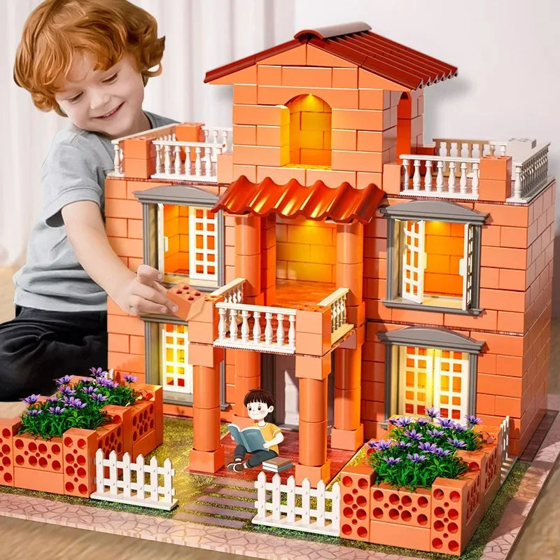 A child is interacting with a detailed orange brick miniature house model set.