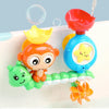 A cartoon monkey shower toy with a water sprinkler, featuring orange and green elements for kids.