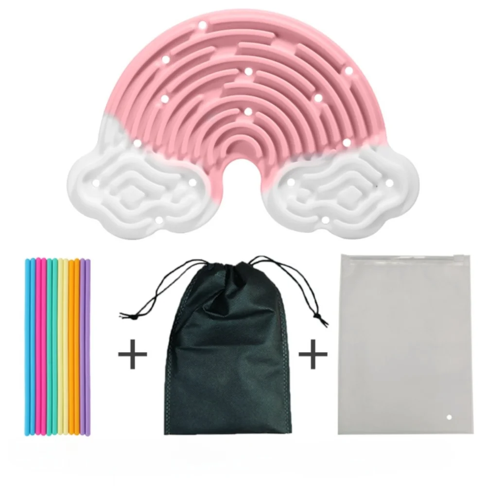 Pink and white silicone sensory activity board with 12 strings and storage bags