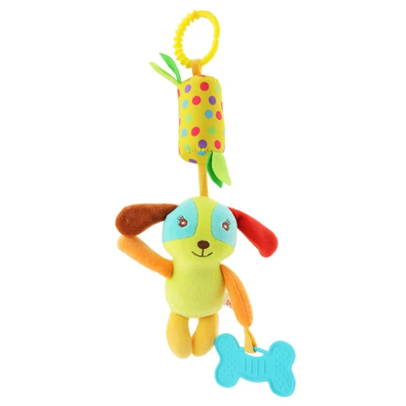 A soft plush hanging baby toy featuring a yellow and green fruit charm and a blue dog figure with a bone accessory.