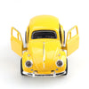 A yellow 1:38 die-cast model of a classic Beetle car viewed from the front.